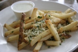 Fries with shaved Parmesan cheese and truffle oil
