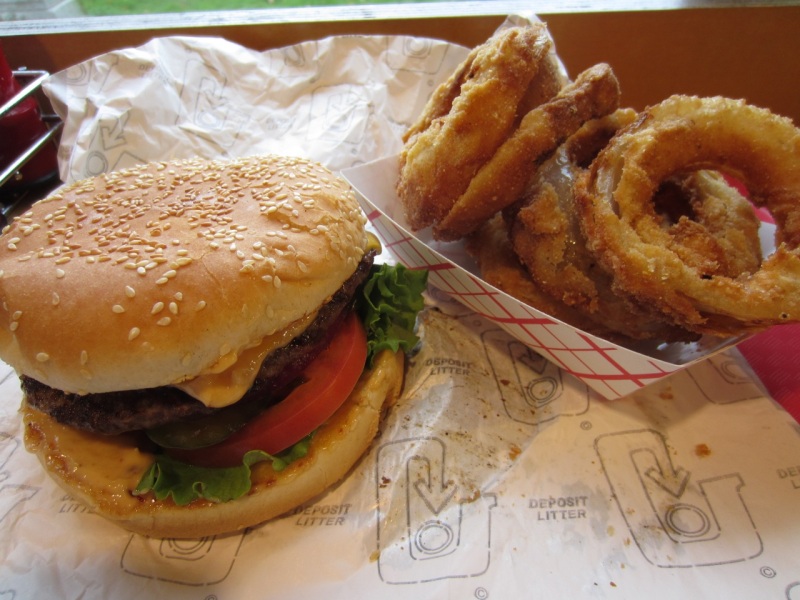 Deluxe cheeseburger with Babe's onion rings