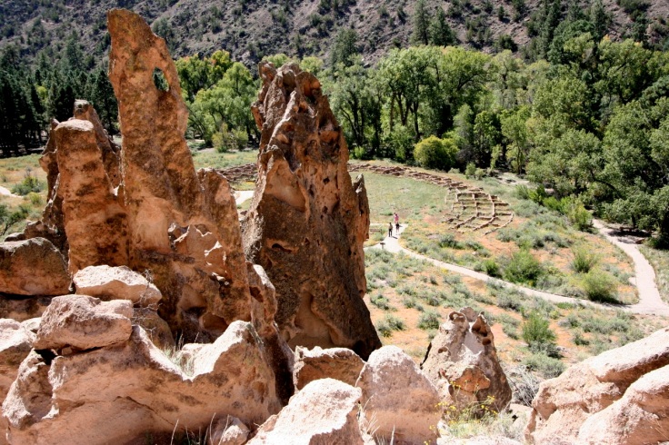 Tuff spires with Tyuonyi ruins in the background
